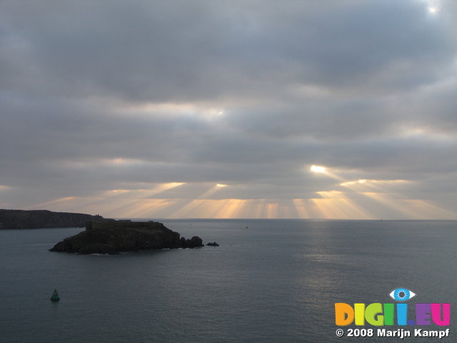 SX01240 Sunrays over fort in Milford Haven entry